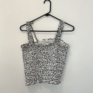 Adorable navy and white smocked tank. Size Medium. Lots of stretch